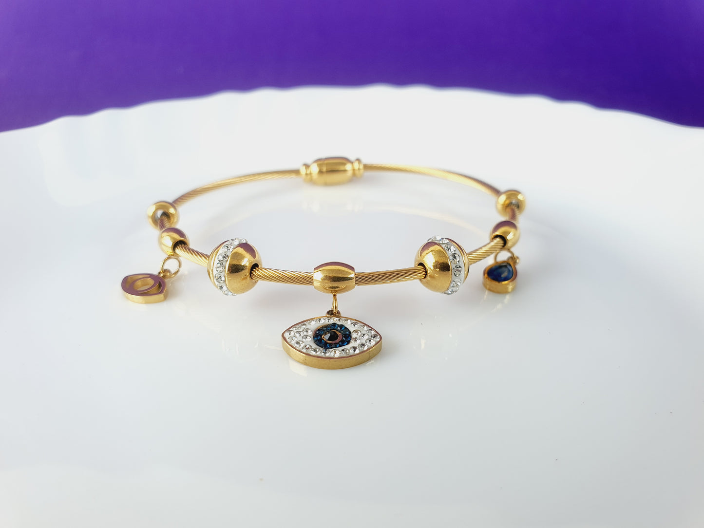 GOLD EVIL EYE SPIRAL BRACELET X