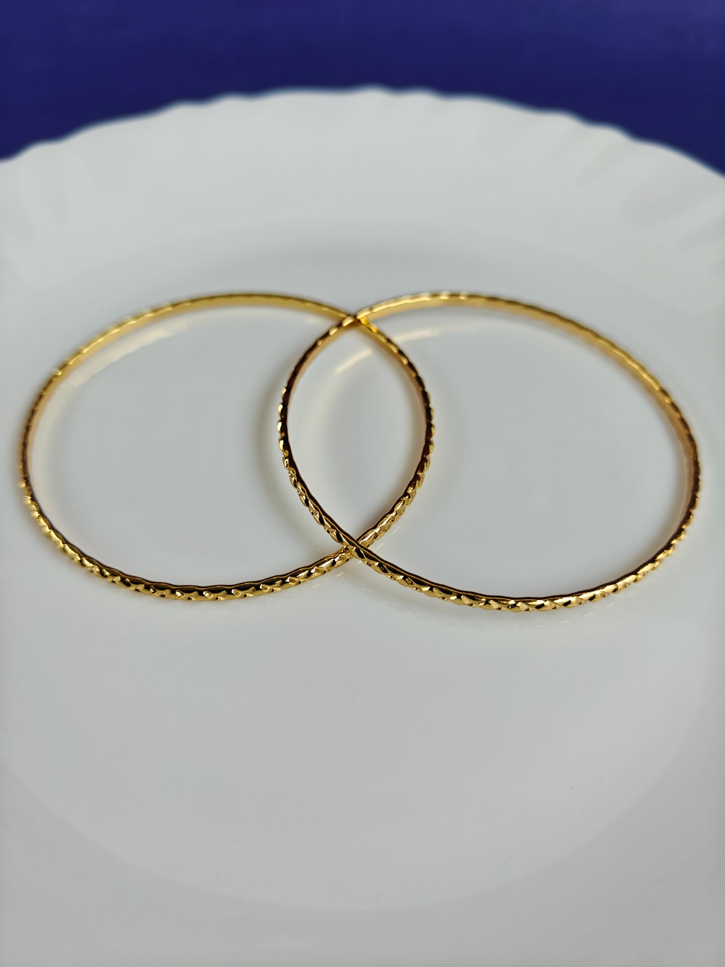 GOLD BANGLES