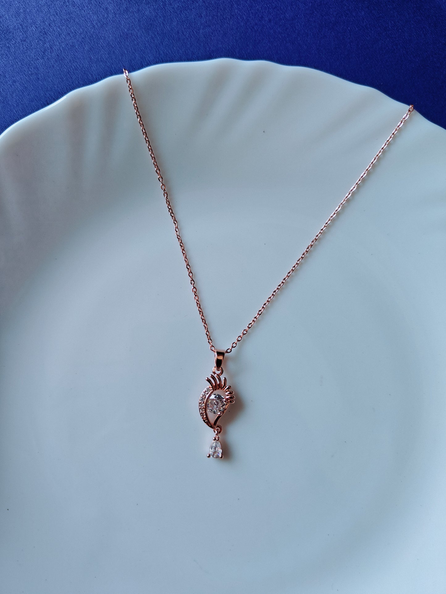 ROSEGOLD EVIL EYE R E1'