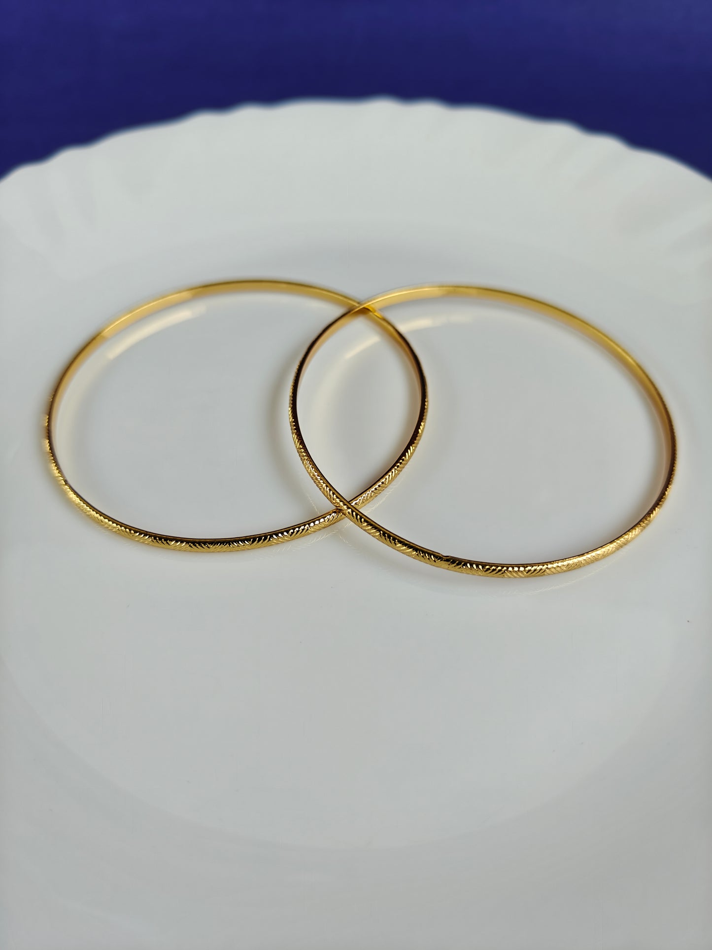 GOLD BANGLES