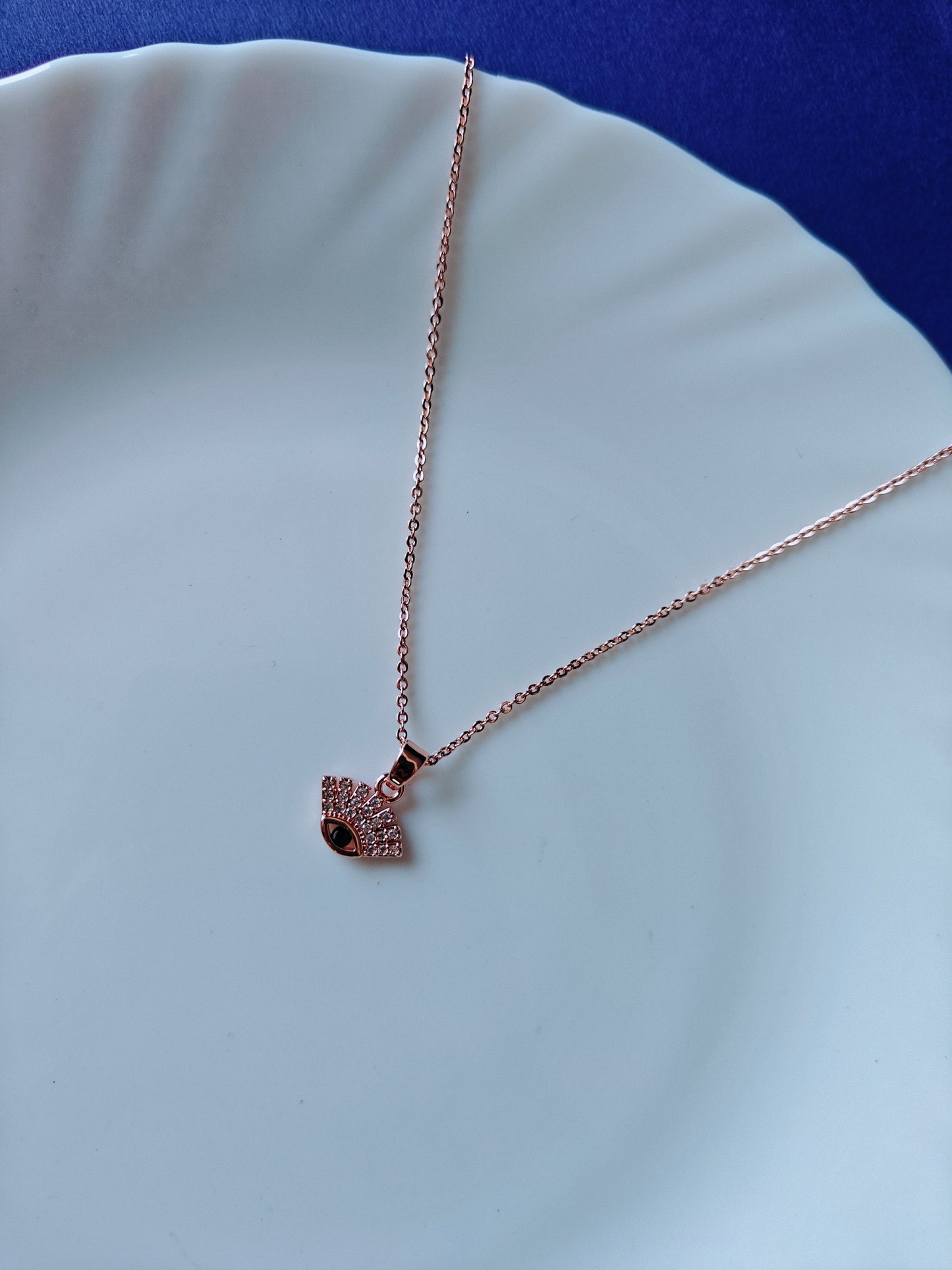 ROSEGOLD EVIL EYE K E1'