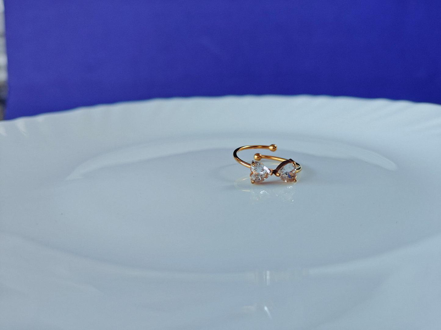 GOLD ADJUSTABLE RING ..