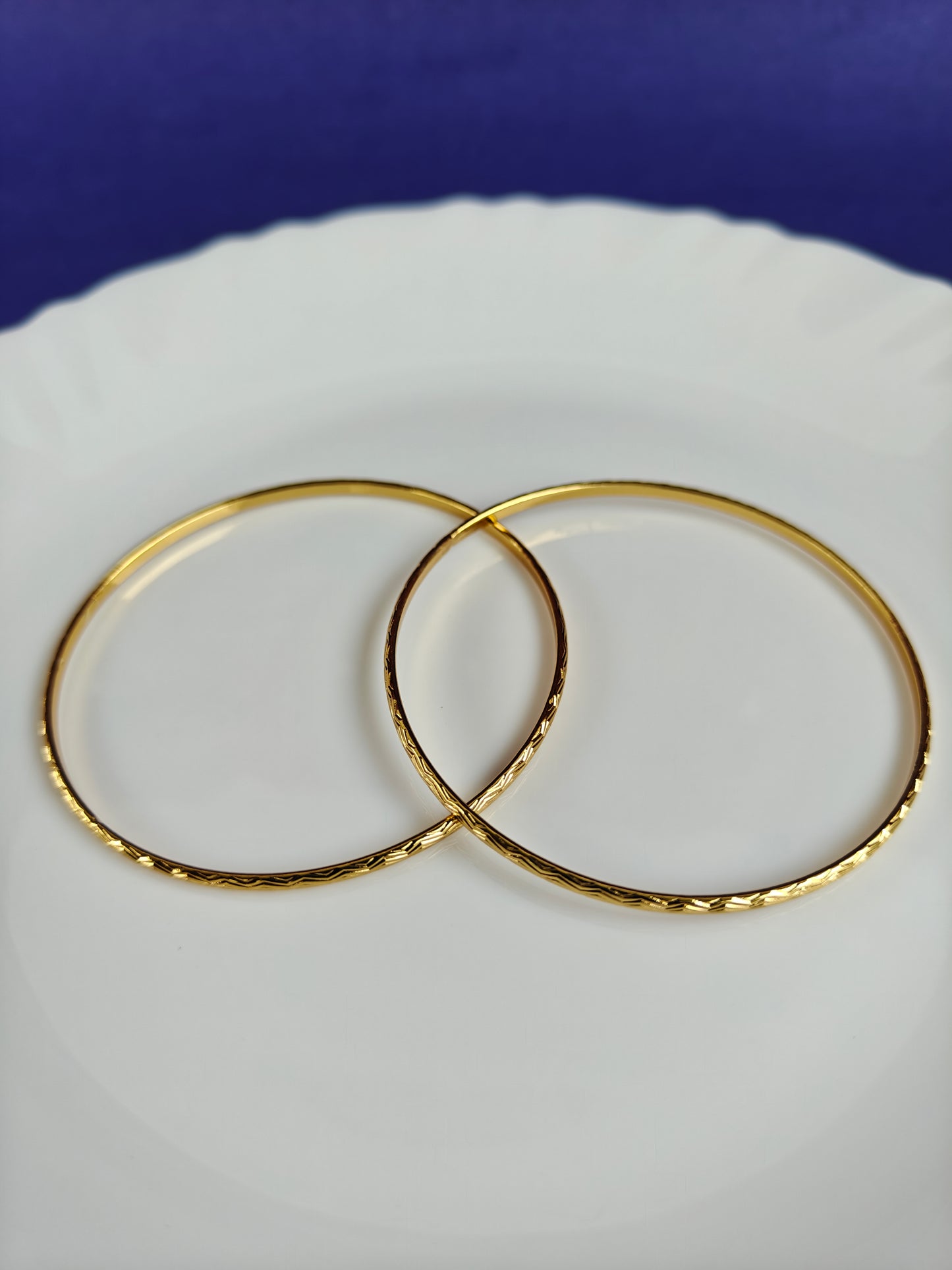 GOLD BANGLES