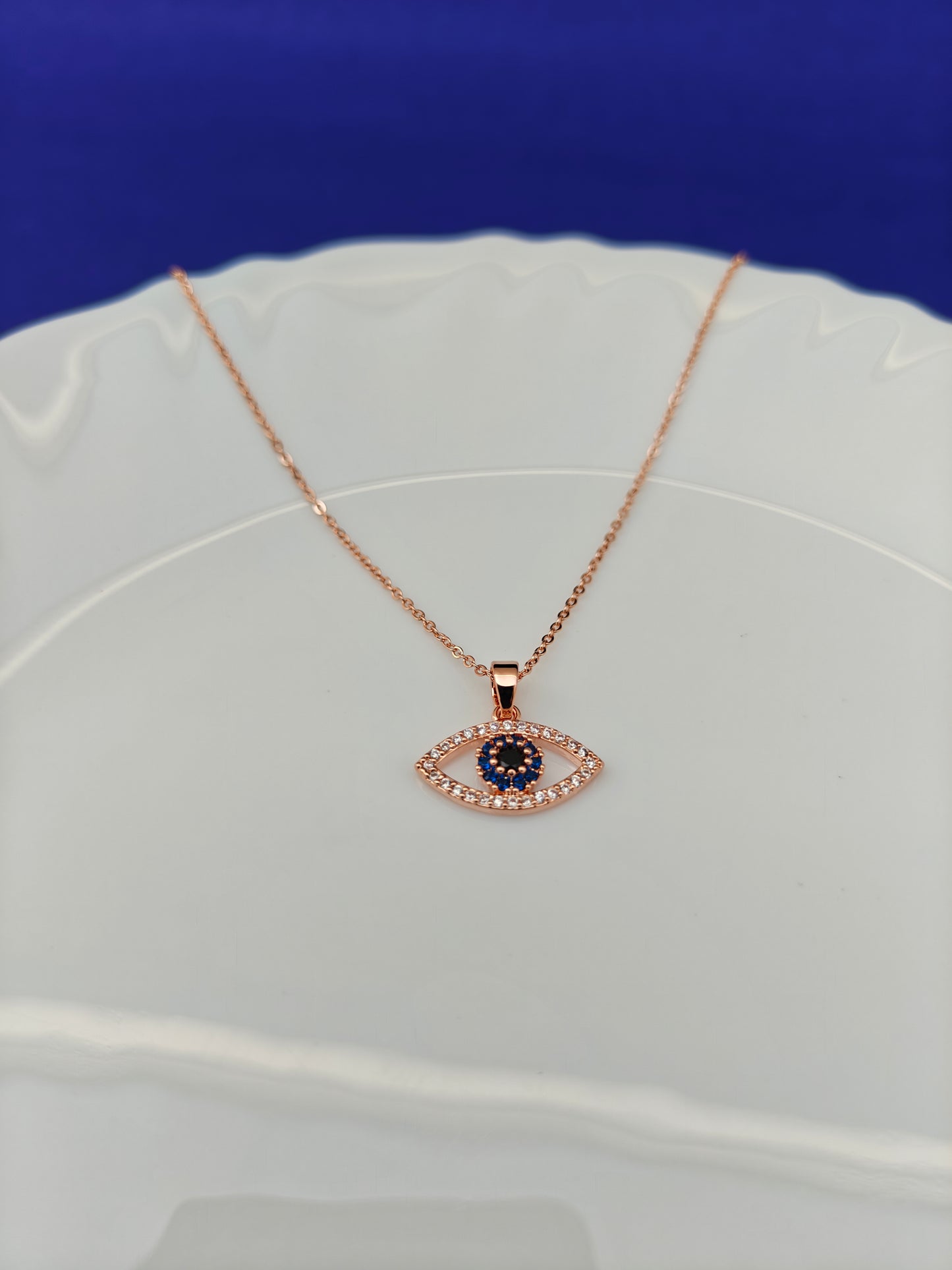 ROSEGOLD EVIL EYE C E1 X