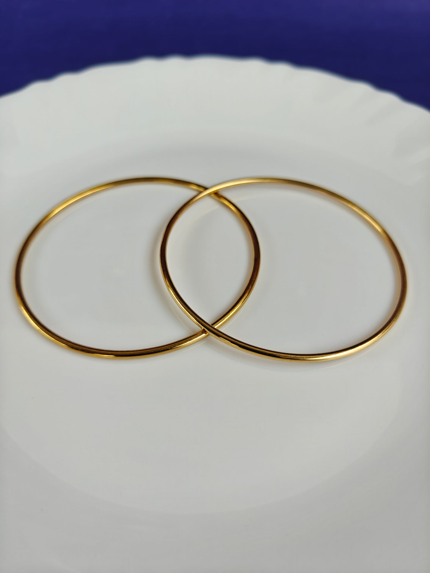 GOLD BANGLES