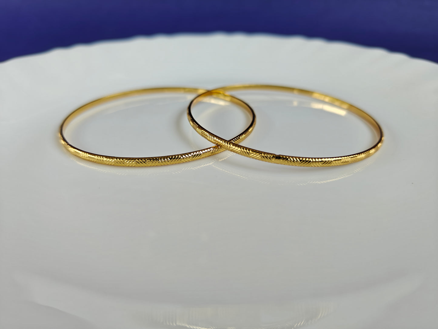 GOLD BANGLES