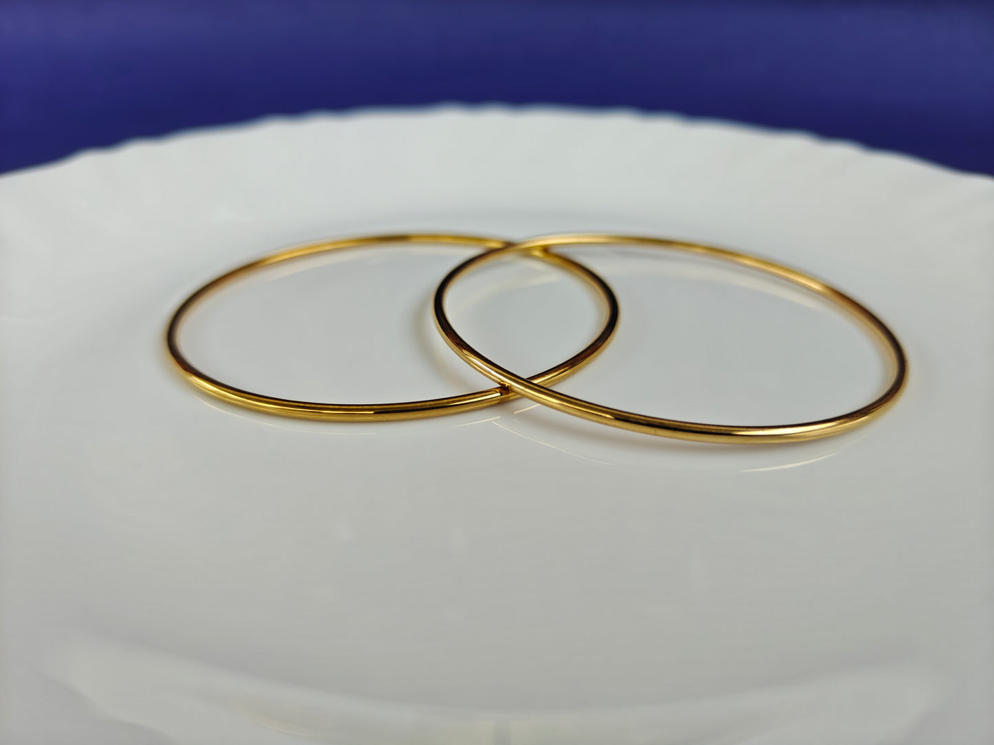 GOLD BANGLES