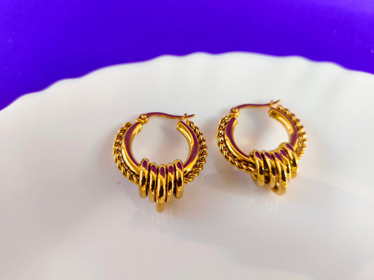 GOLD EARRING W G T1 X