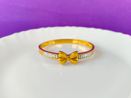 GOLD BRACELET BOW X