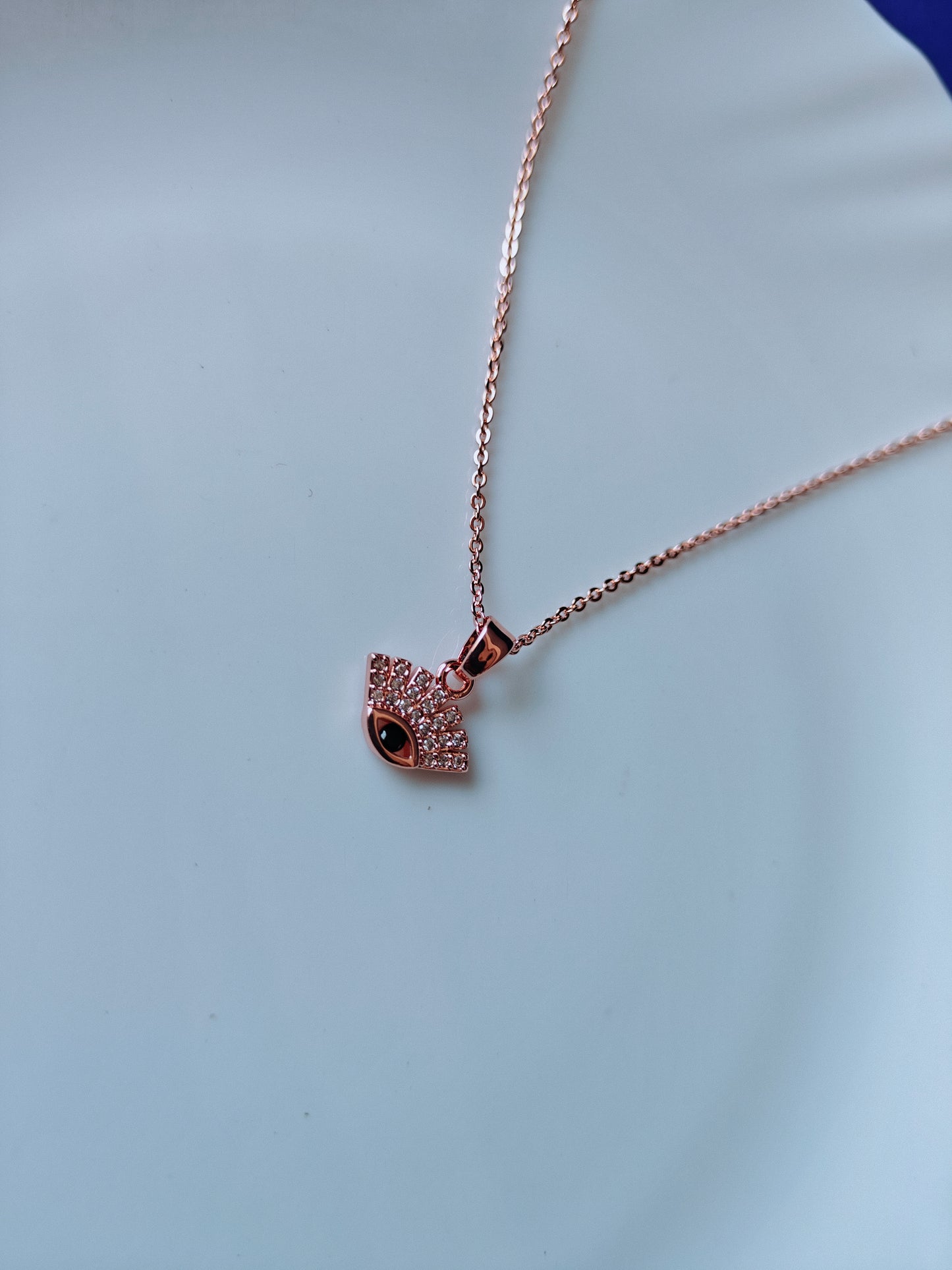 ROSEGOLD EVIL EYE K E1'