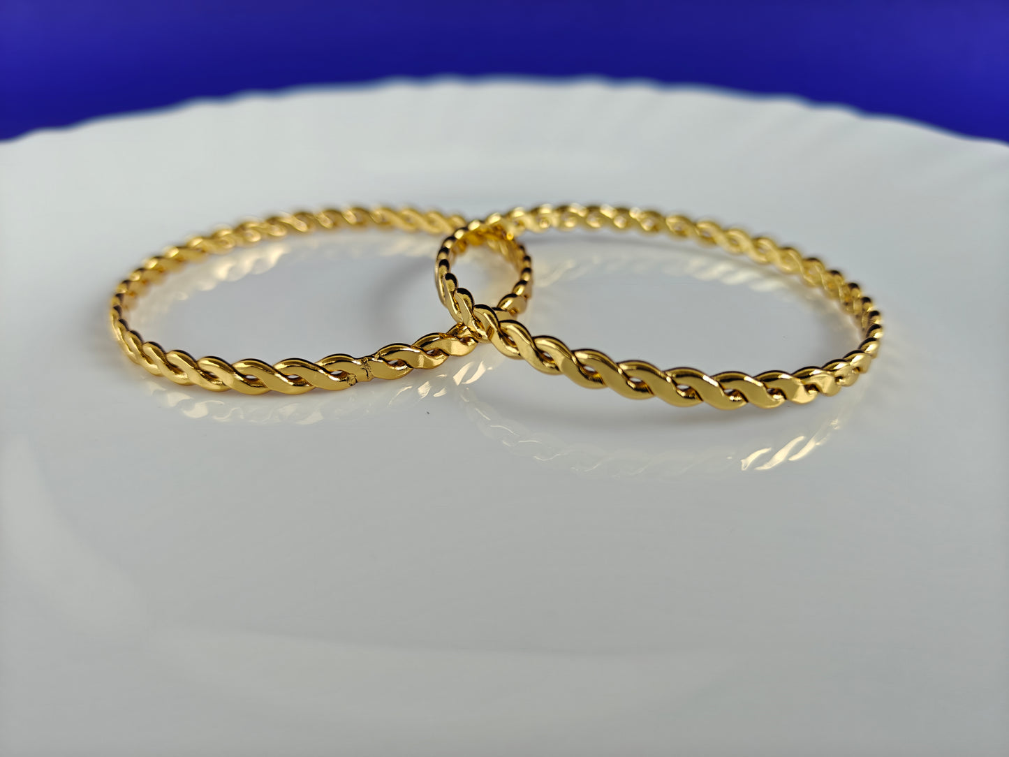 GOLD BANGLES