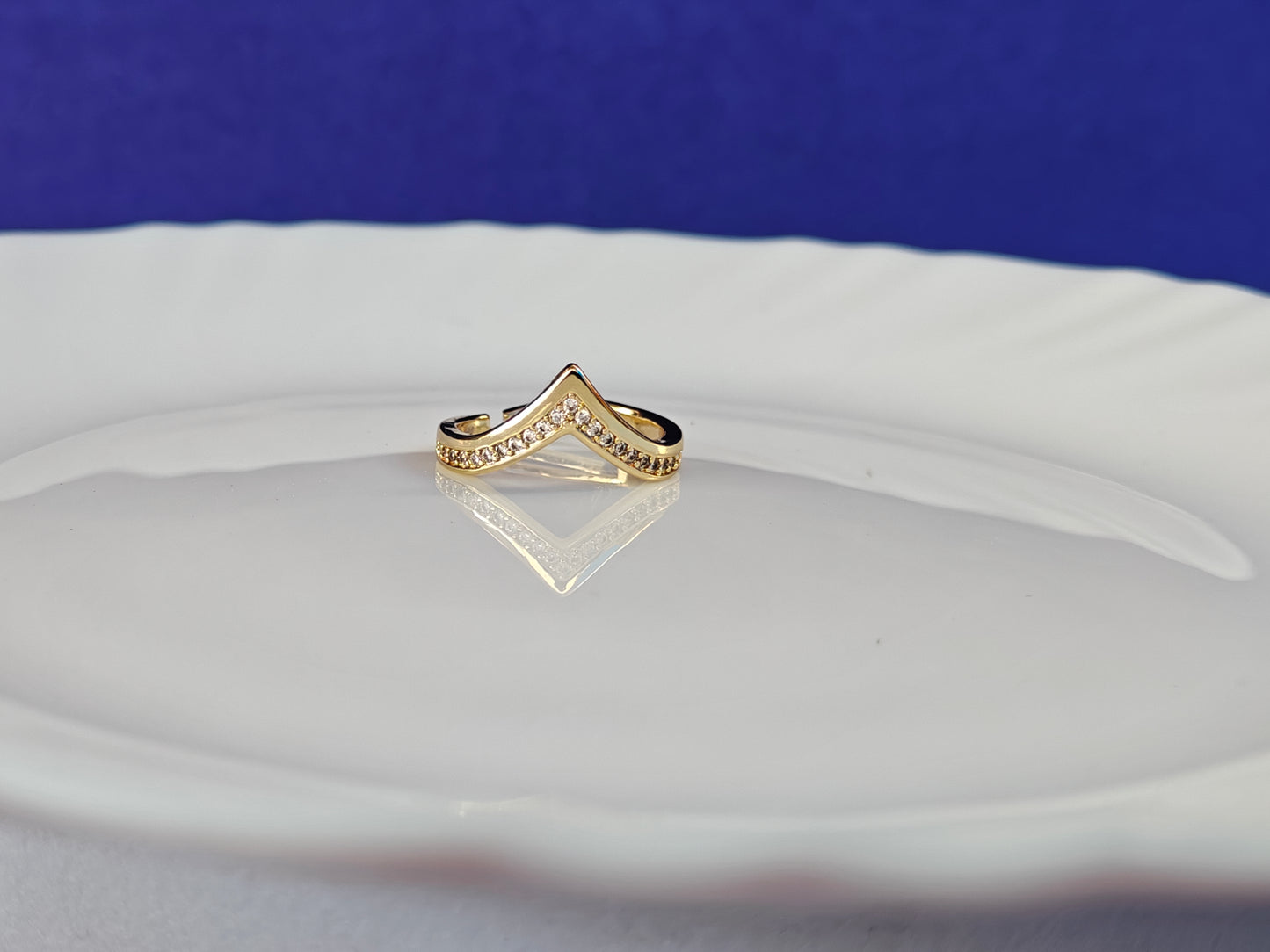 GOLD ADJUSTABLE RING ..