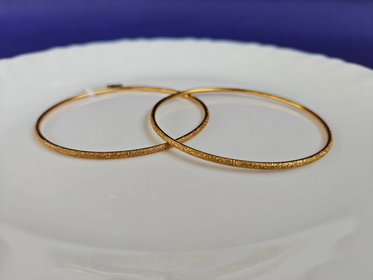 GOLD BANGLES
