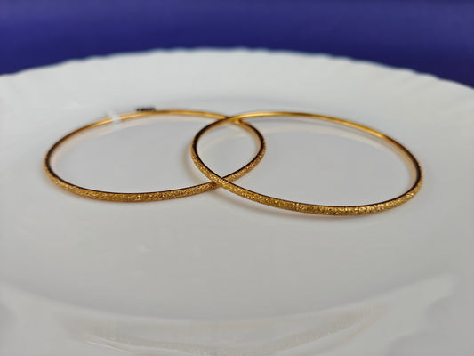 GOLD BANGLES