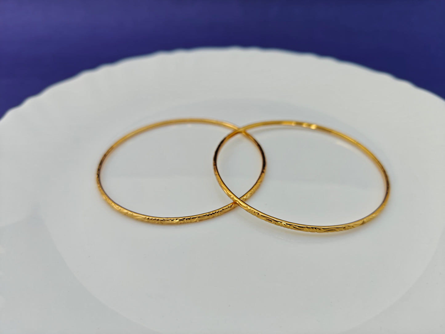 GOLD BANGLES