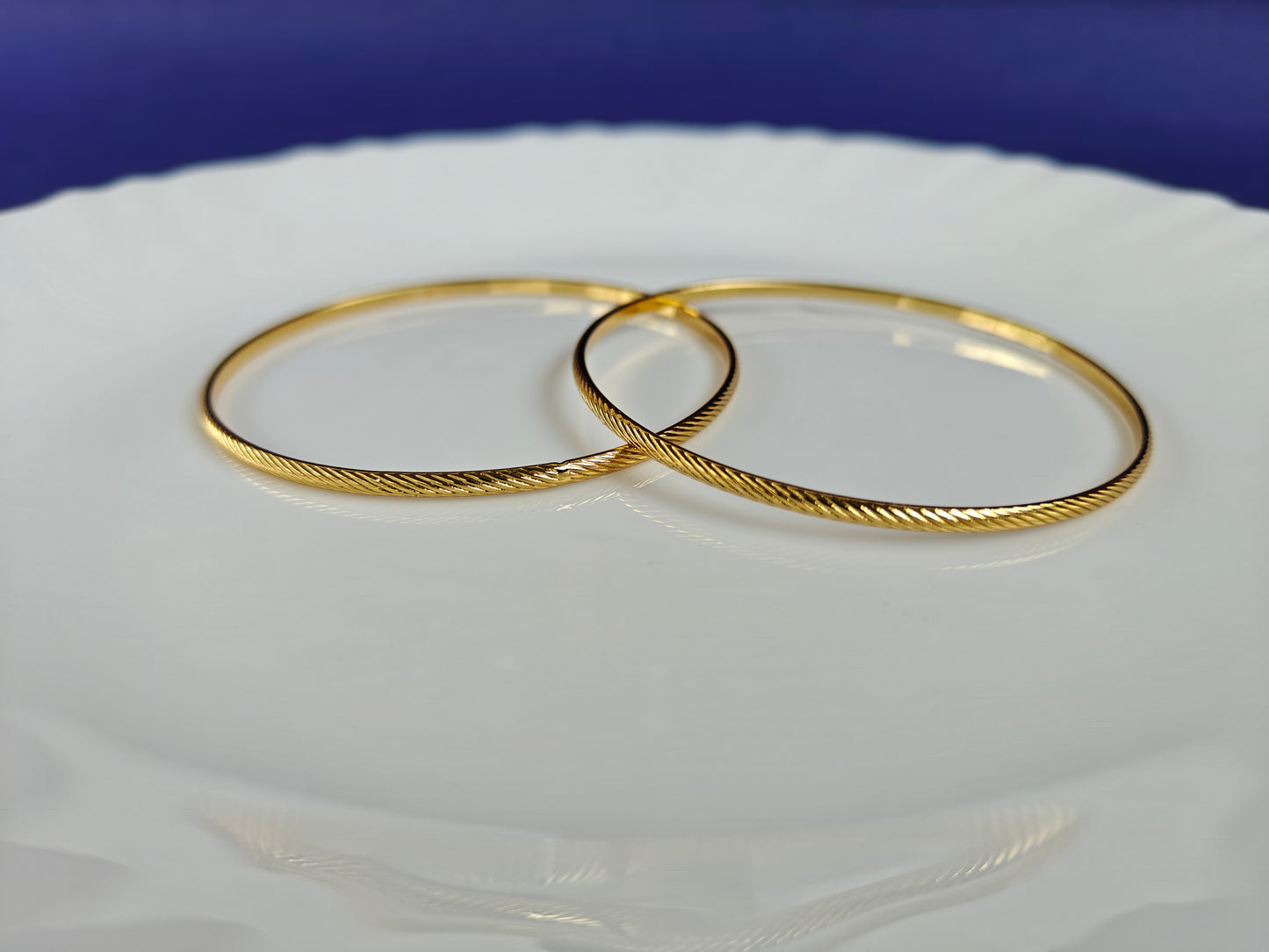 GOLD BANGLES