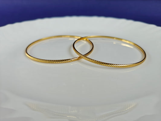 GOLD BANGLES