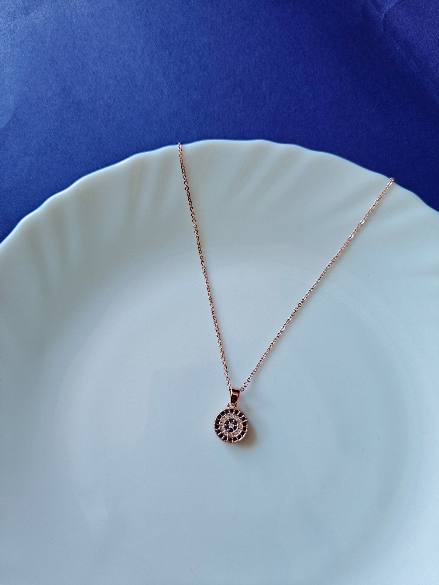ROSEGOLD EVIL EYE N E1'