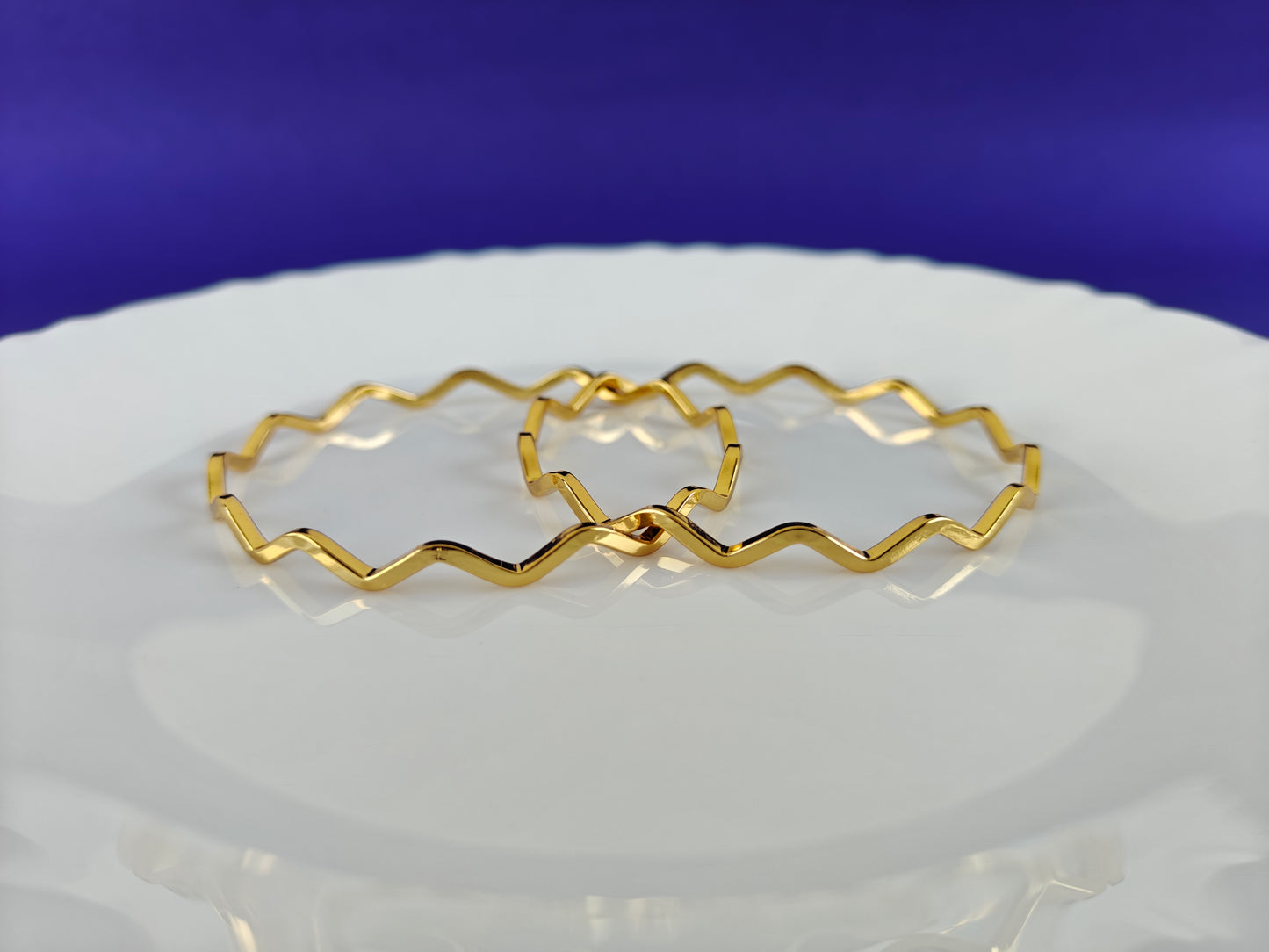 GOLD BANGLES