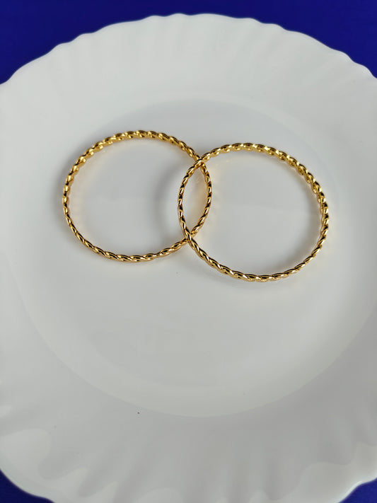 GOLD BANGLES