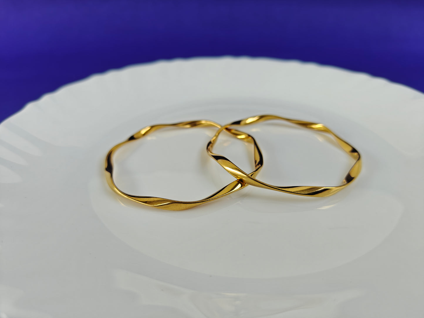 GOLD BANGLES