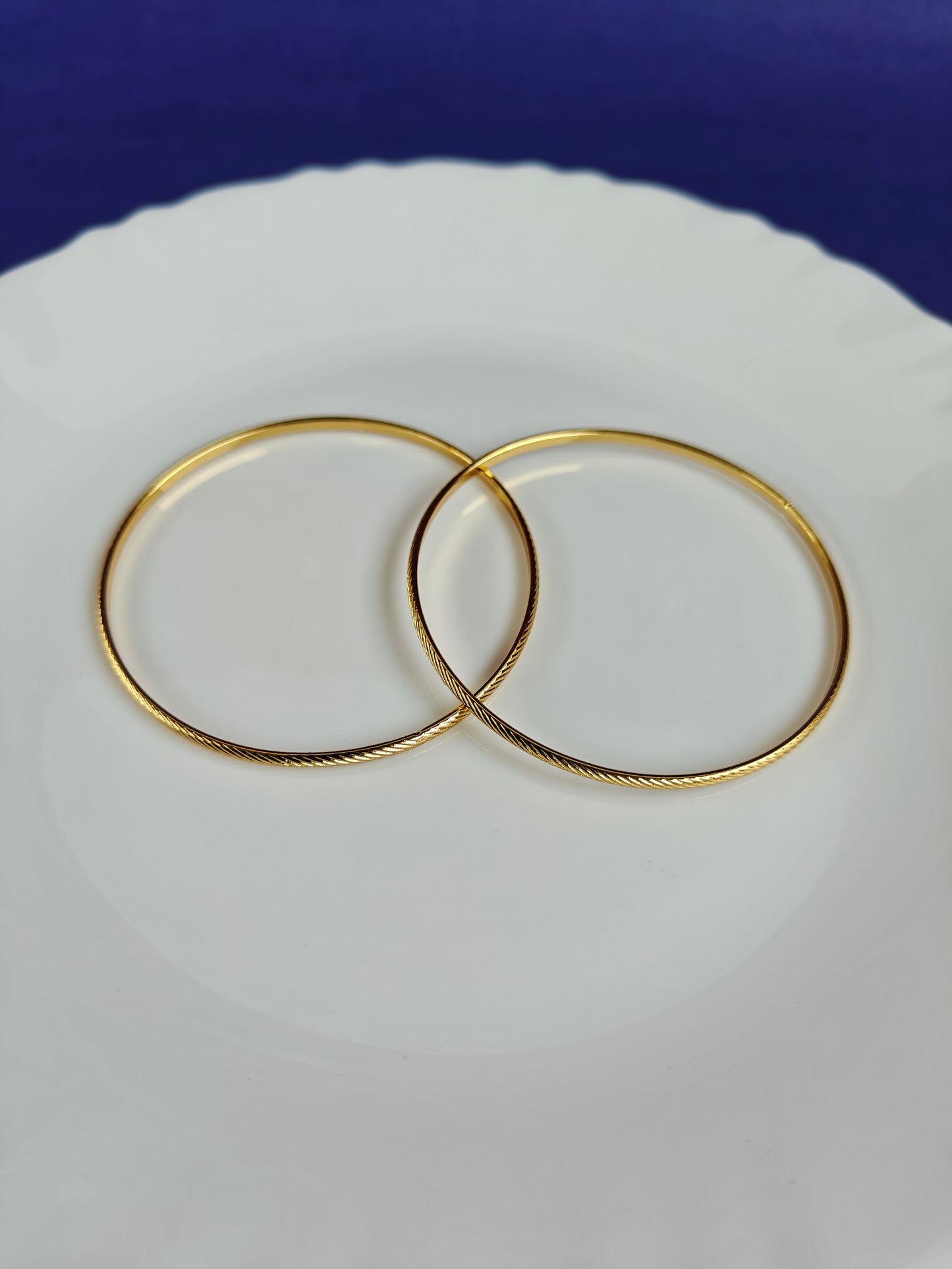 GOLD BANGLES