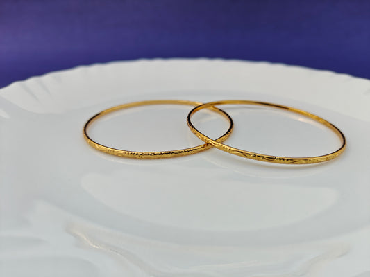 GOLD BANGLES