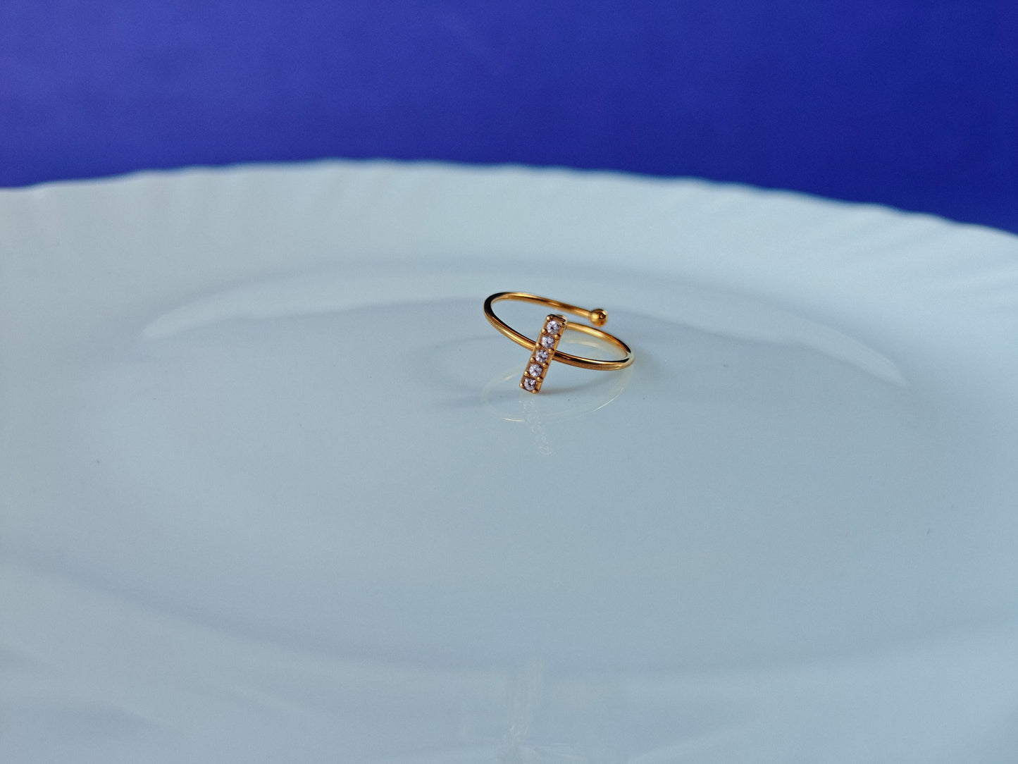 GOLD ADJUSTABLE RING ..