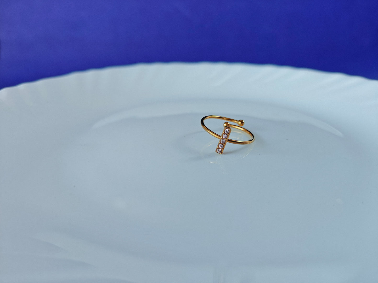 GOLD ADJUSTABLE RING ..
