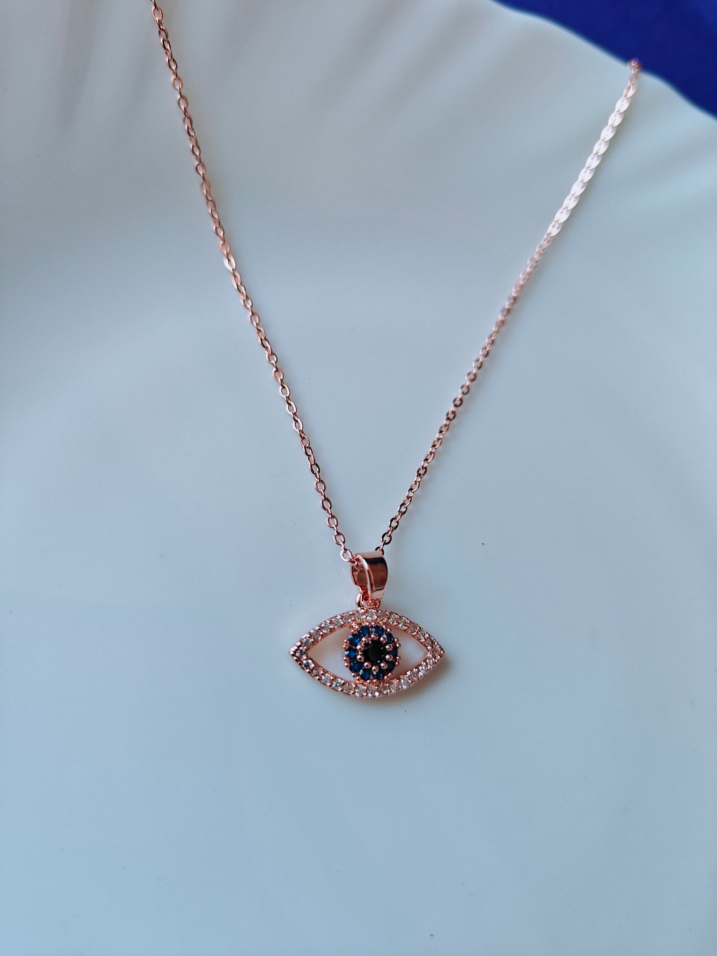 ROSEGOLD EVIL EYE Q E1'