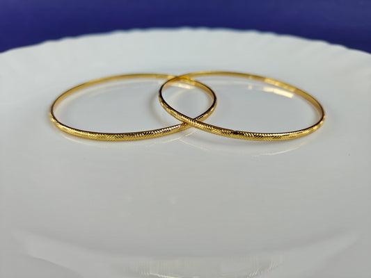 GOLD BANGLES