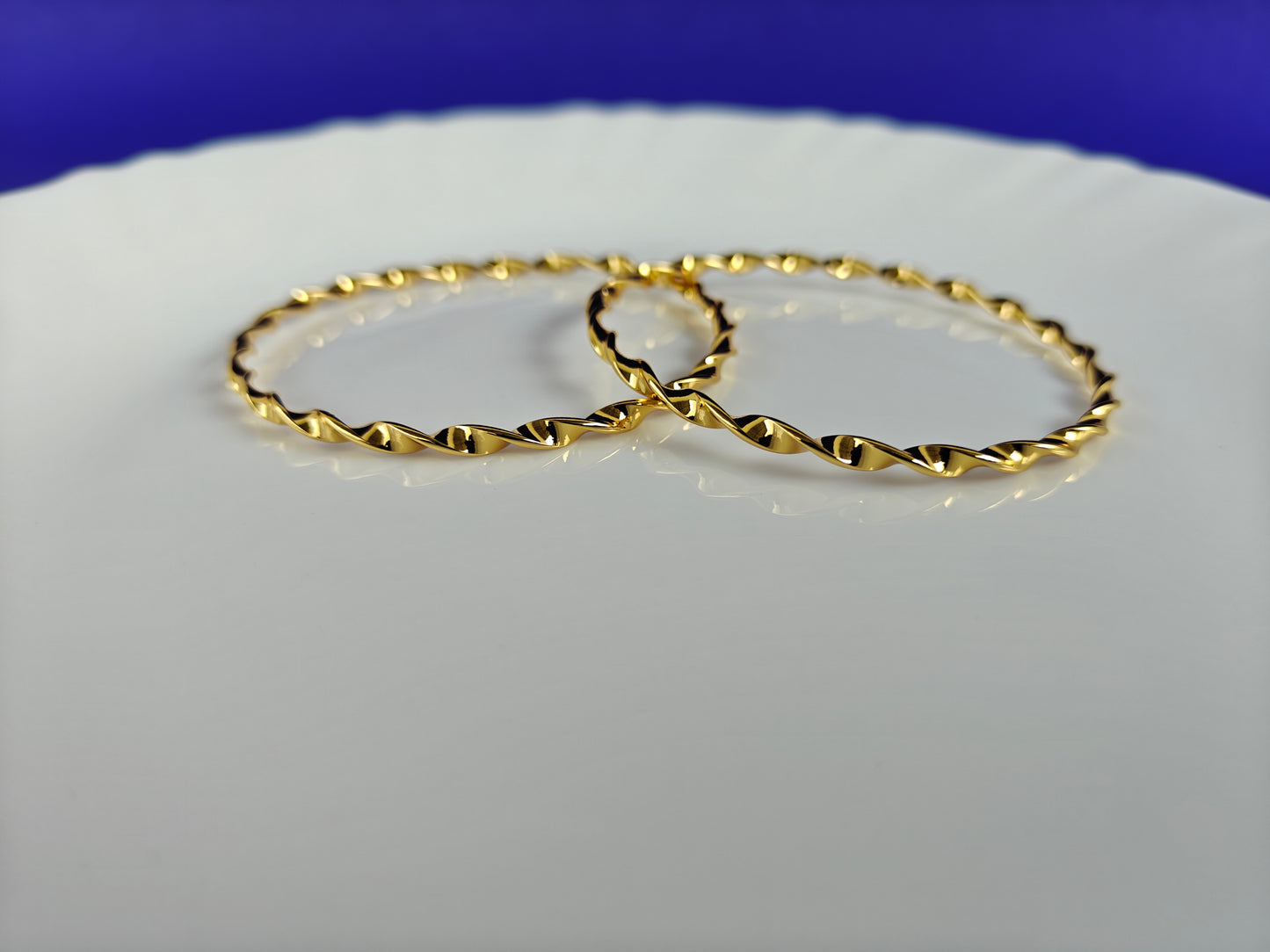 GOLD BANGLES